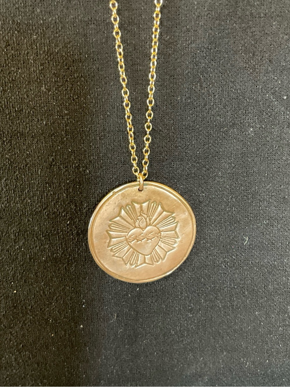 Sacred Heart Medallion Necklace made of bronze with an 18 inch gold filled chain